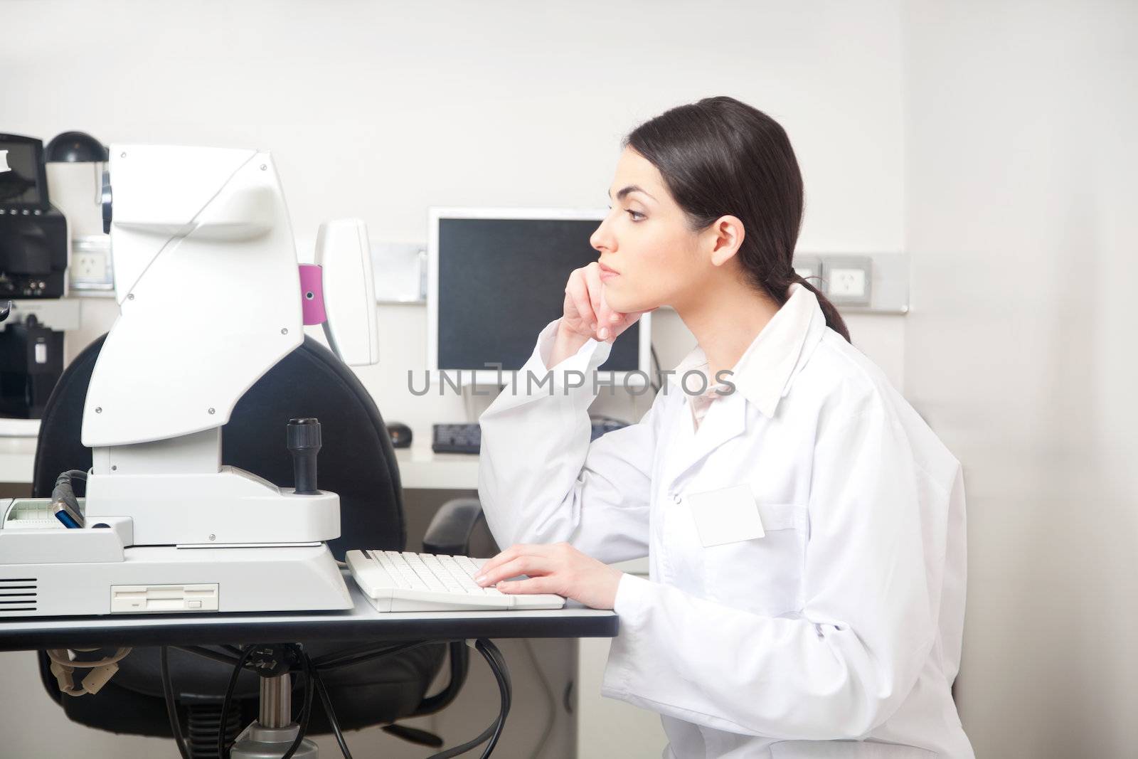 Portrait of female optometrist in clinic.