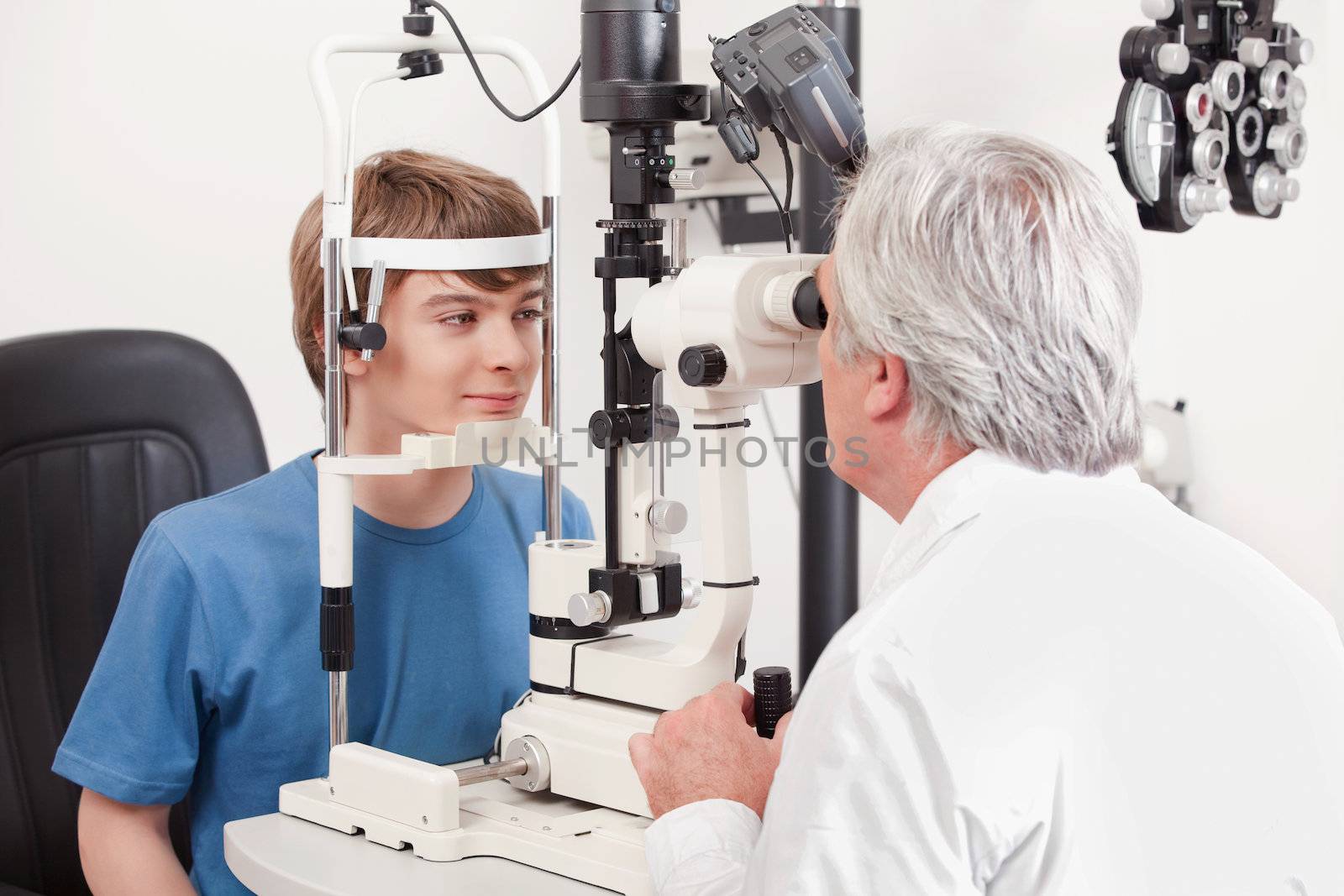 Optometrist Doing Sight Testing by leaf