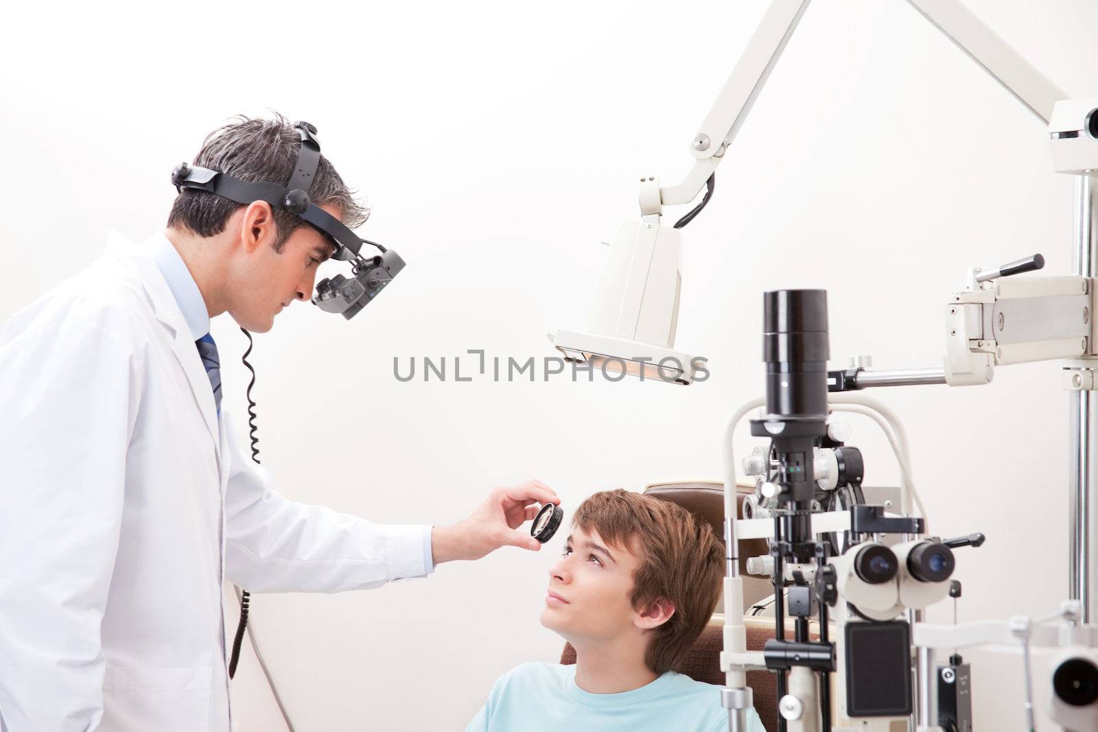 Optometrist taking an eyesight test examination.