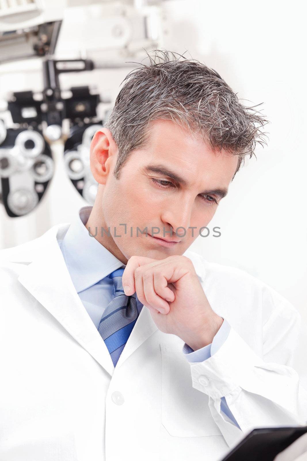 Doctor in Ophthalmology Clinic by leaf