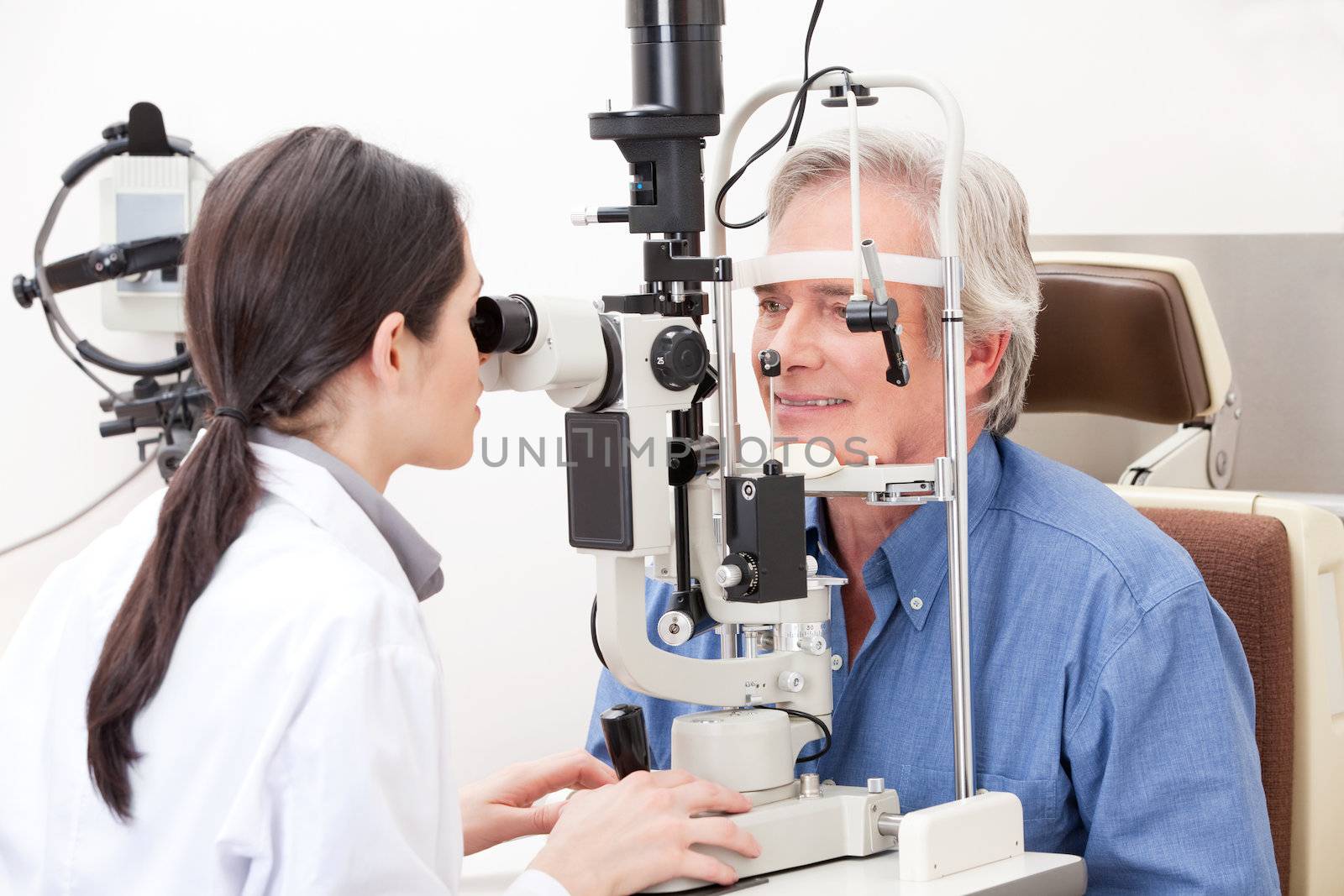 Optometrist doing Sight Testing by leaf