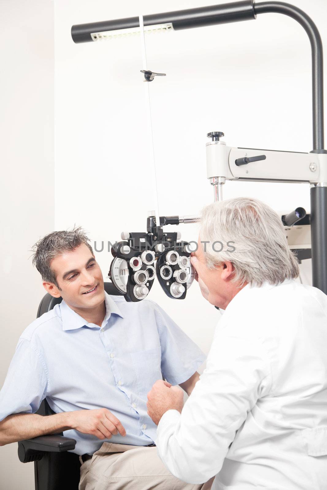 Optometrist doing Sight Testing by leaf