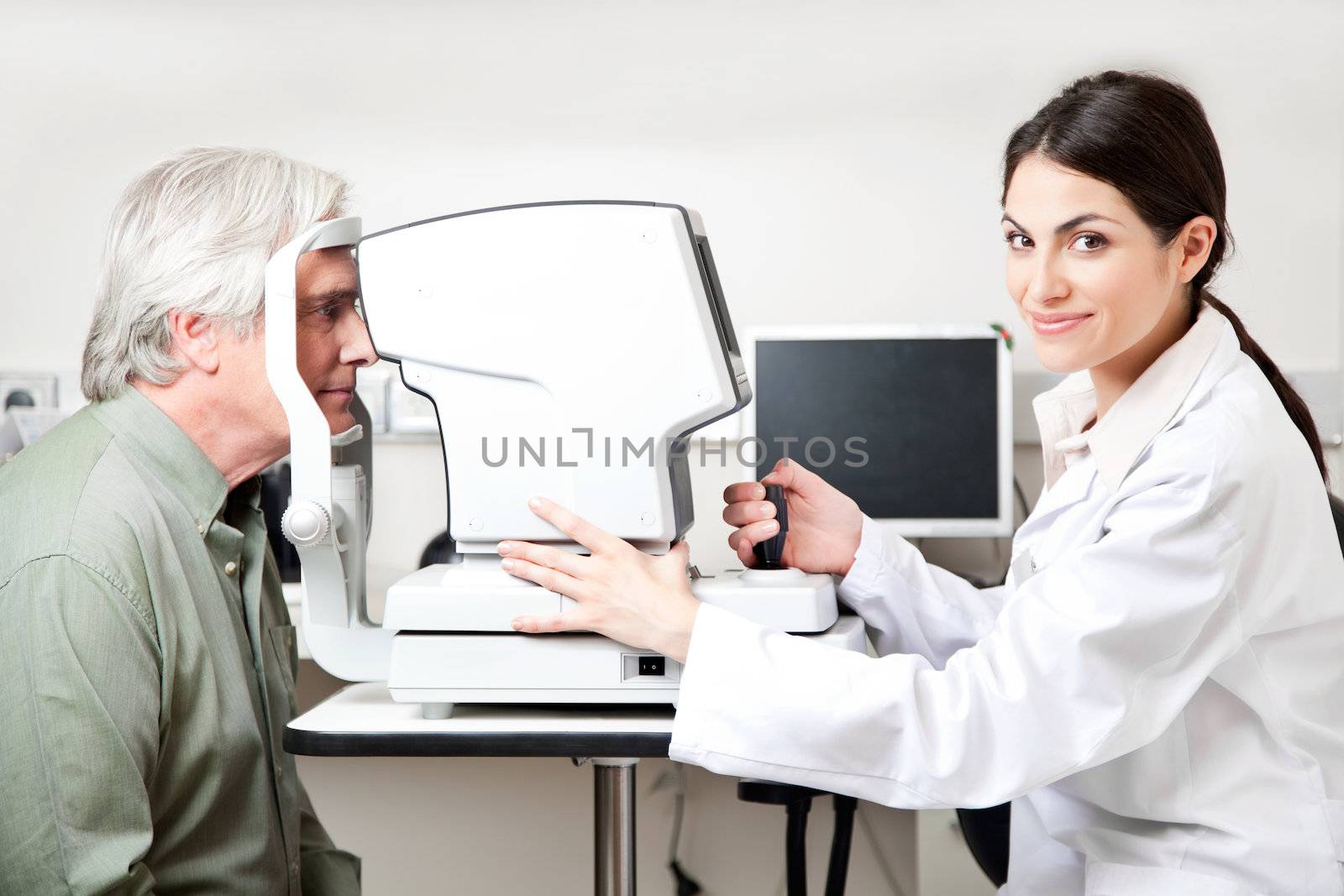 Optometrist taking an eyesight test examination.