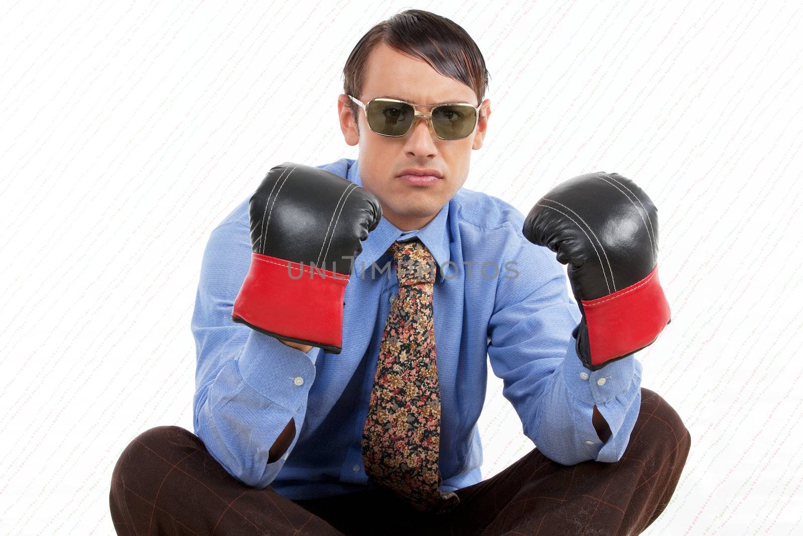 Retro business man wearing boxing gloves