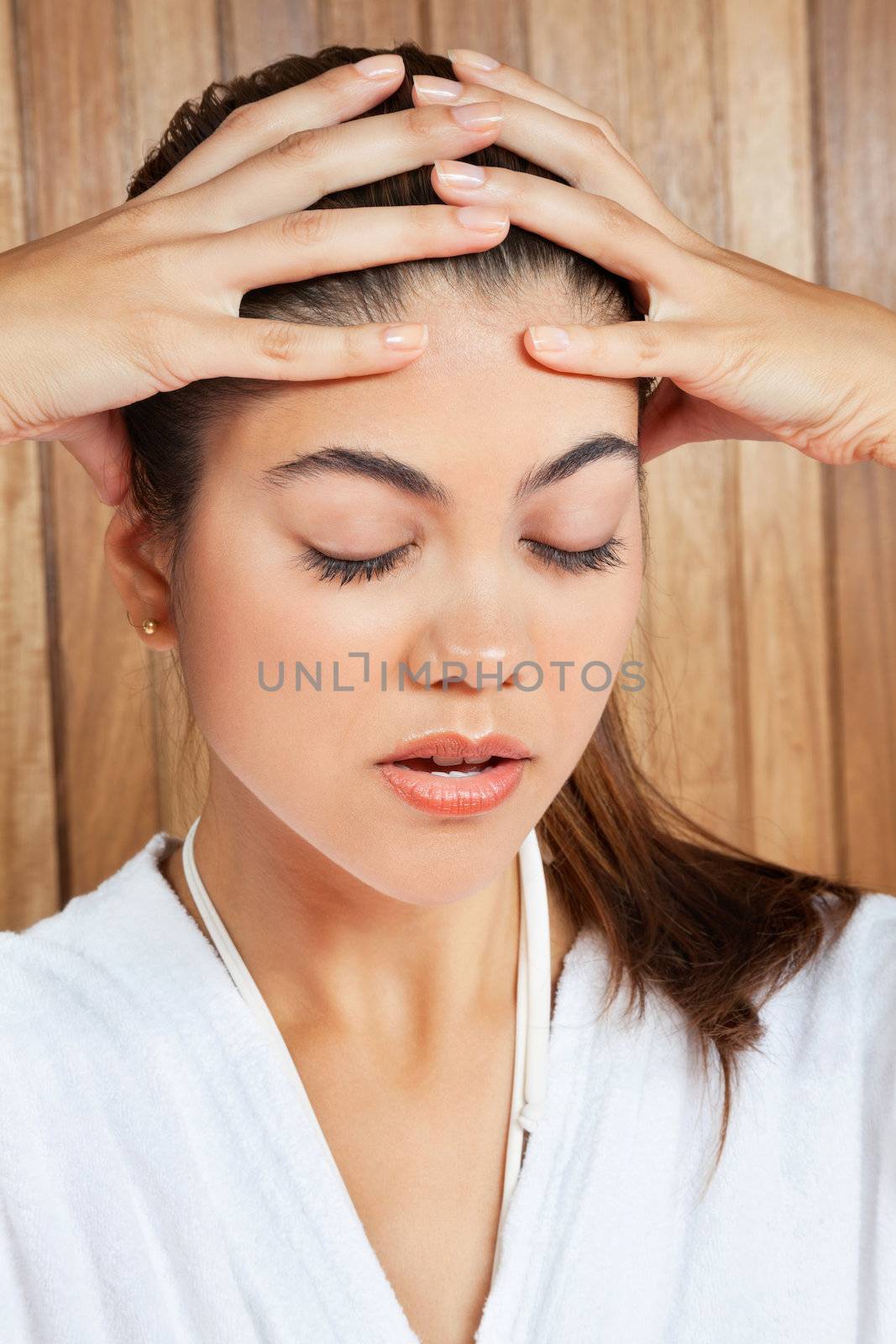 Woman Suffering Headache by leaf