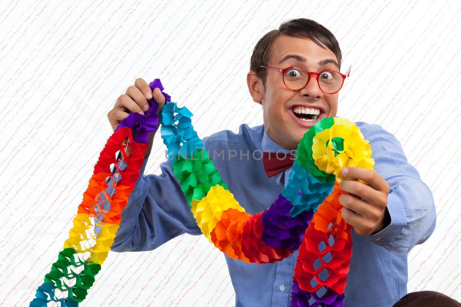 Geek with colorful streamer and big smile