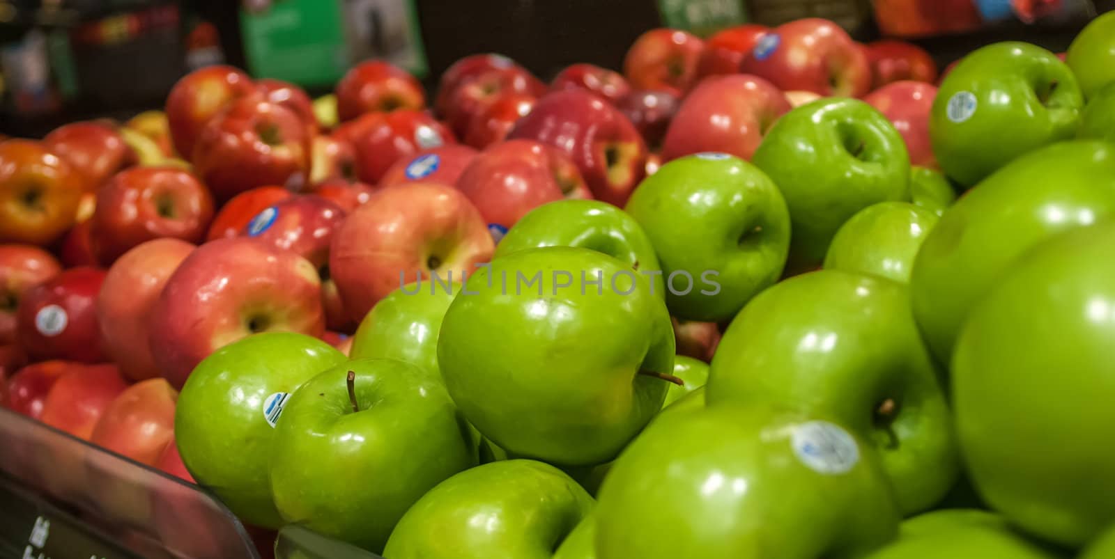 apples on display at farmers market