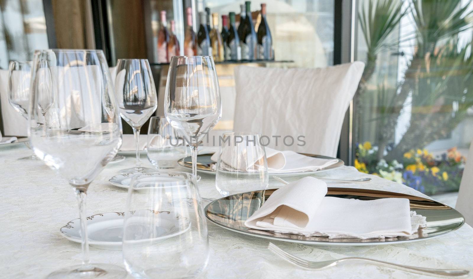 Wedding catering with plate and cutlery disposition on the table