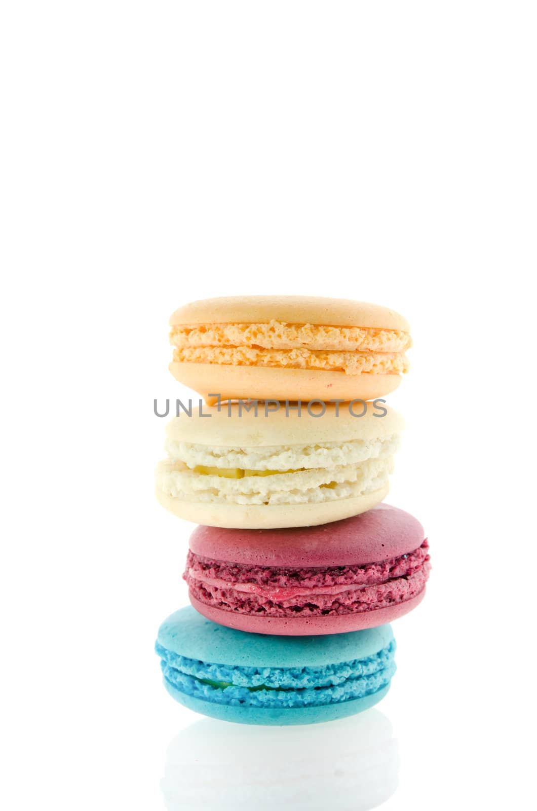 traditional french macaroons stack on  white background