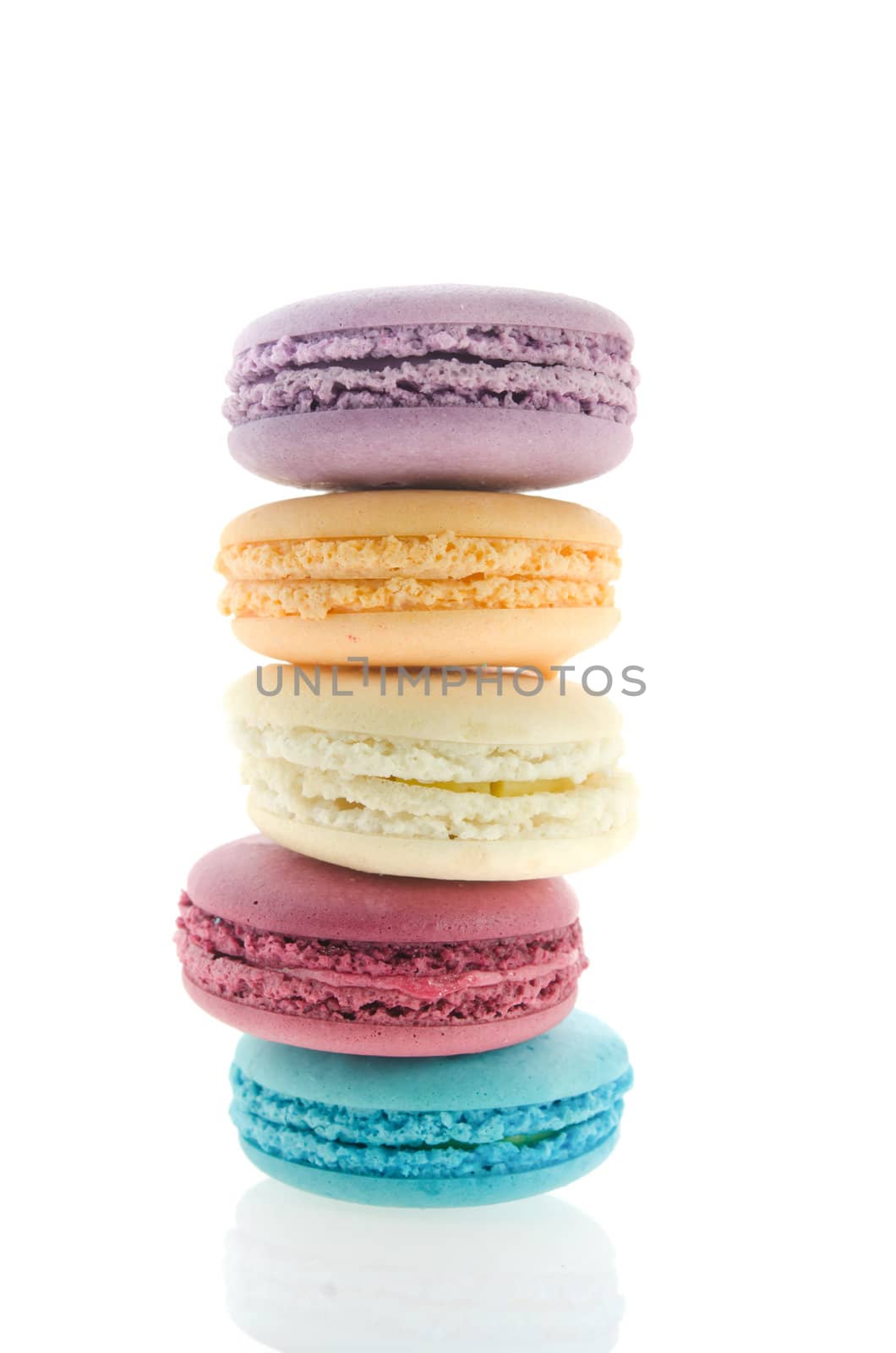 traditional french macaroons stack over  white background