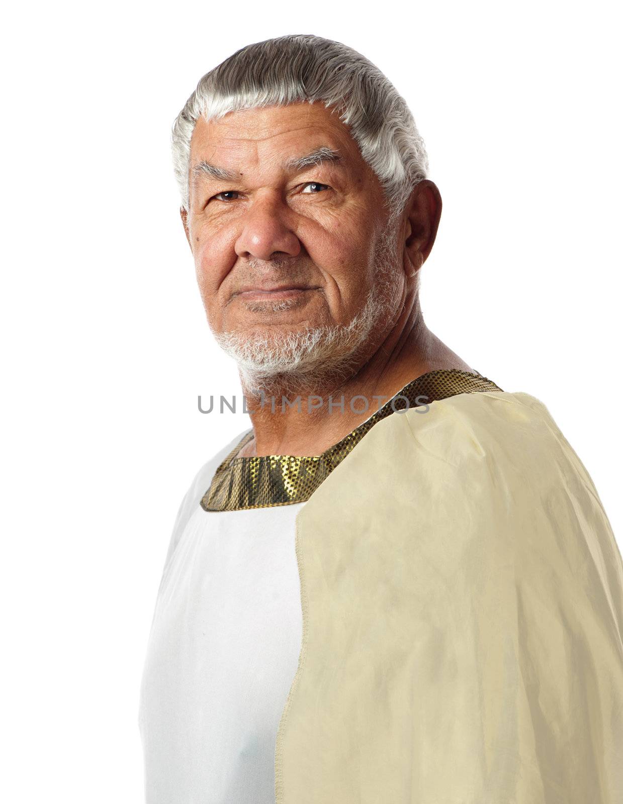 An old man in ancient garment resembles an emperor of days gone by.