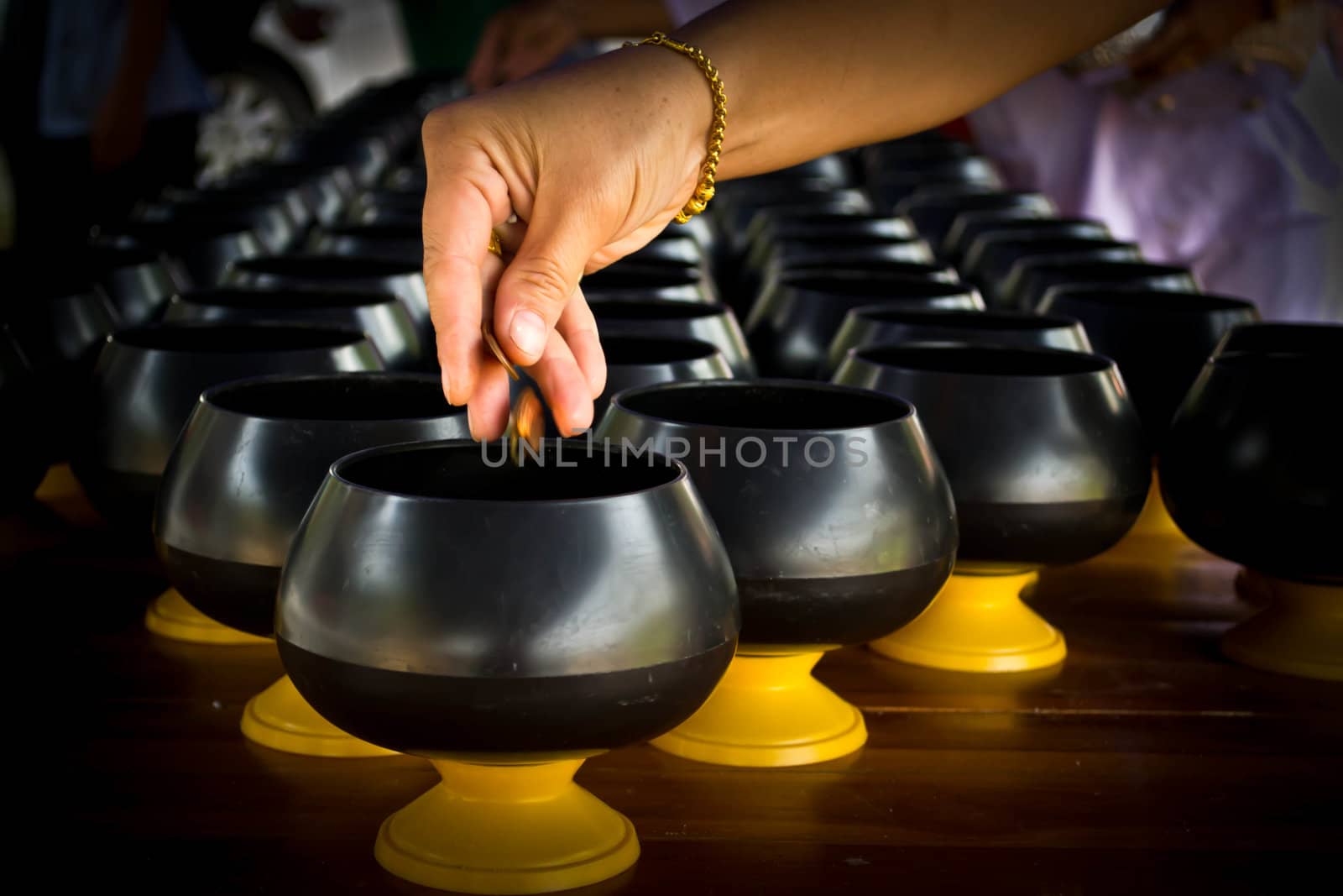 Women coin operated Down in alms bowl, successive in job the way religion Buddhist