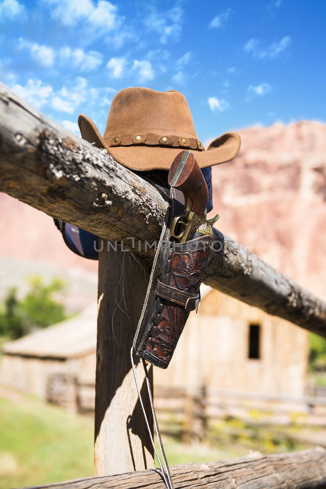 hat and gun in the far west, western spirit