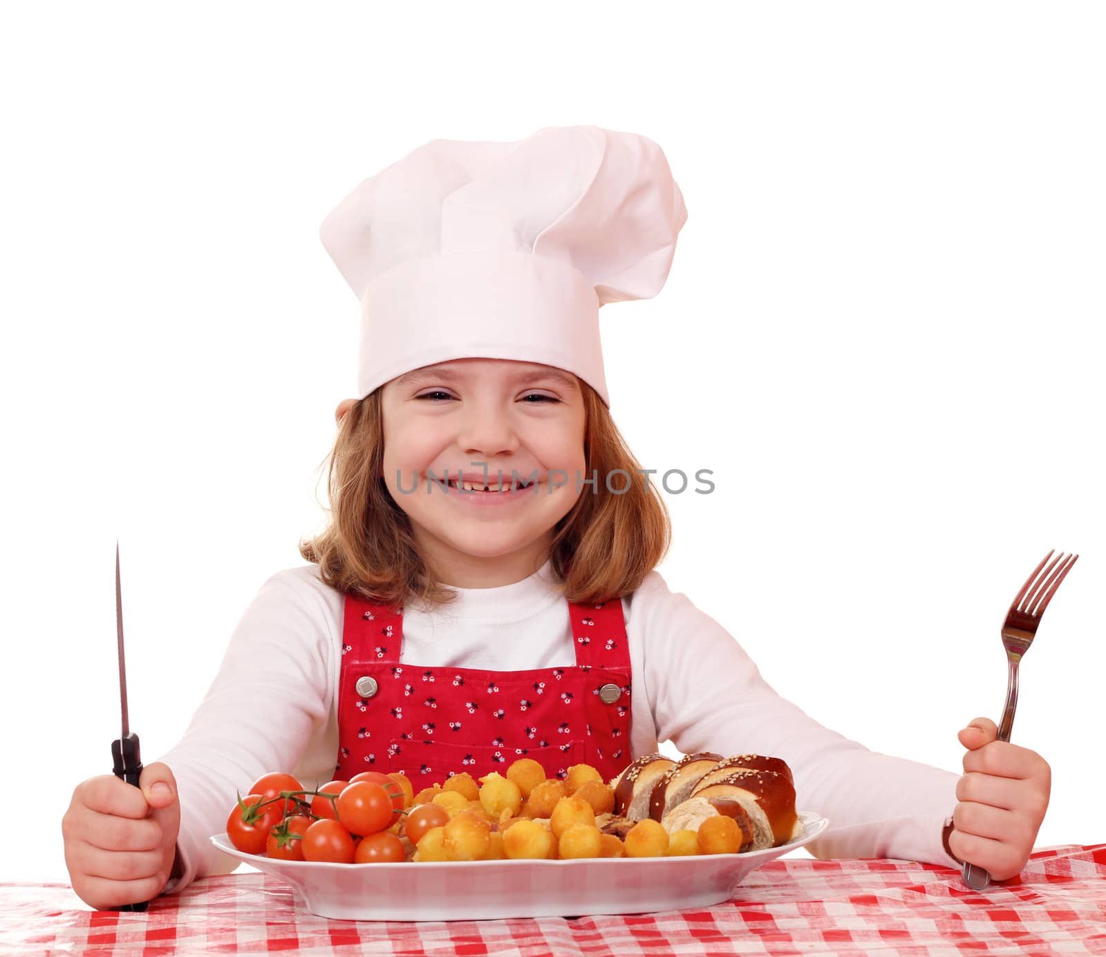happy little girl cook eat gourmet food by goce