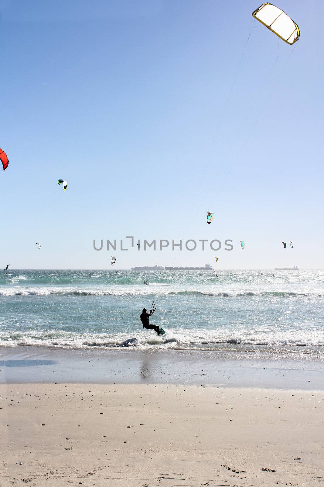 Windsurfers Kitesurfers at the milnerton beach in cape town