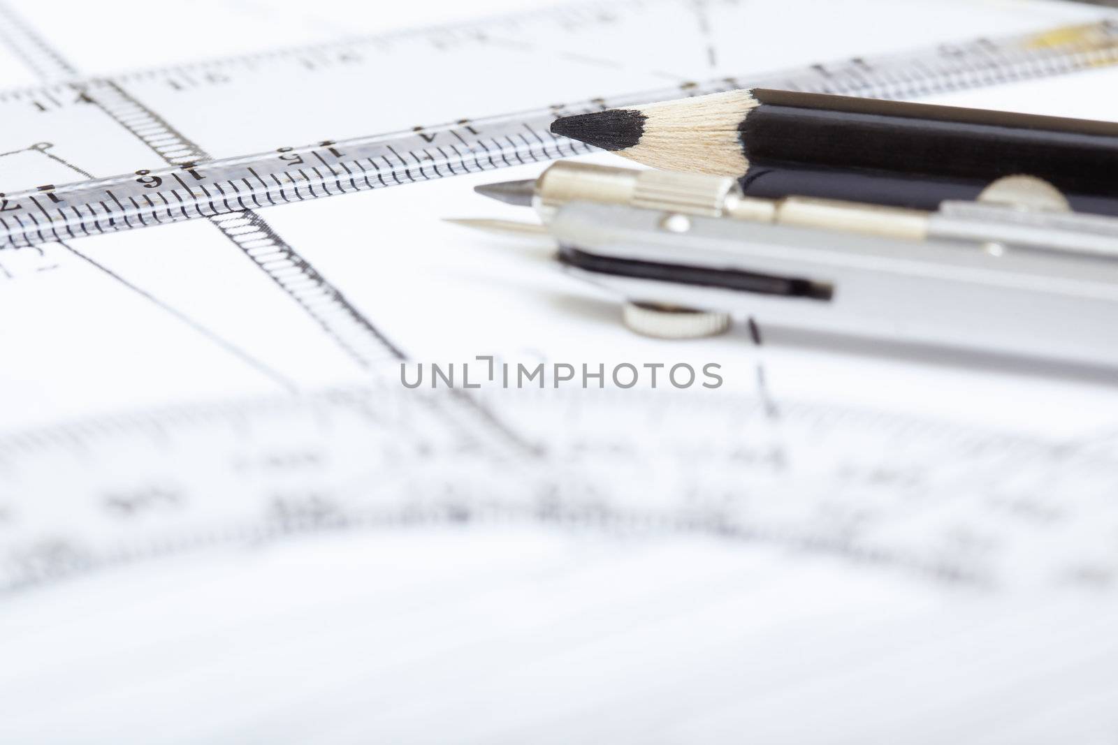 Scheme with drawing tools. Extremely close-up photo. Shallow depth of field