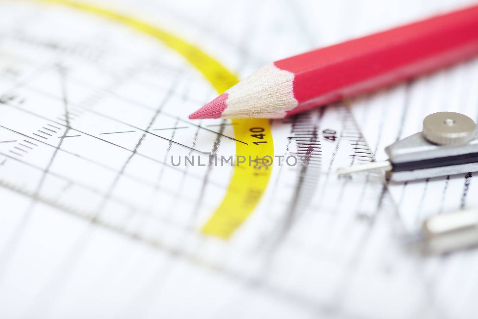 Scheme with compasses rulers and pencil. Close-up photo