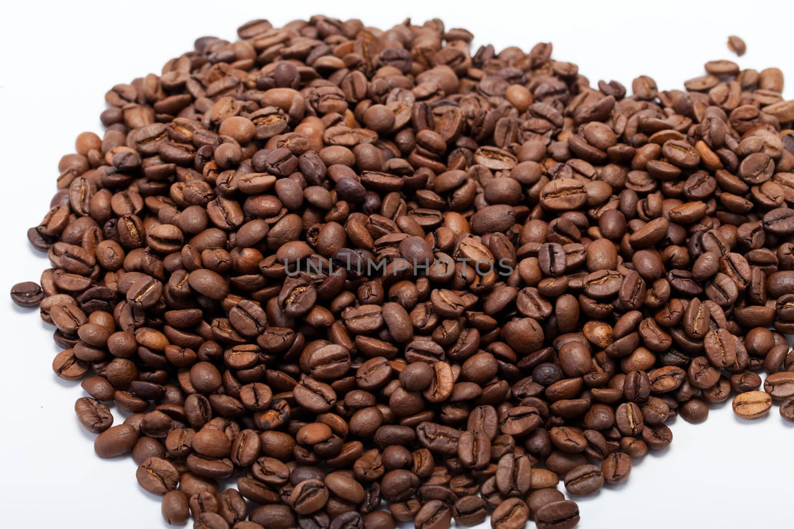 coffee beans close up isolated on white