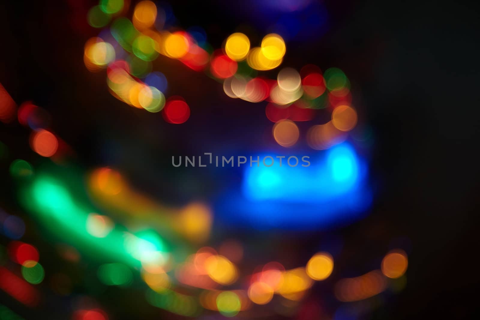 Abstract background with colorful spheres of defocused illumination