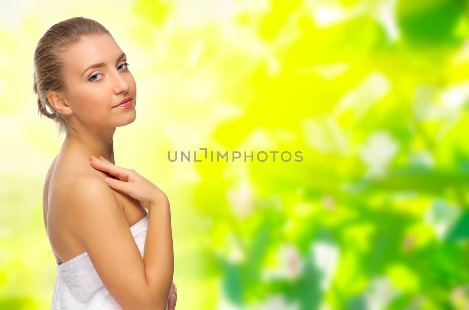 Young girl on floral spring background