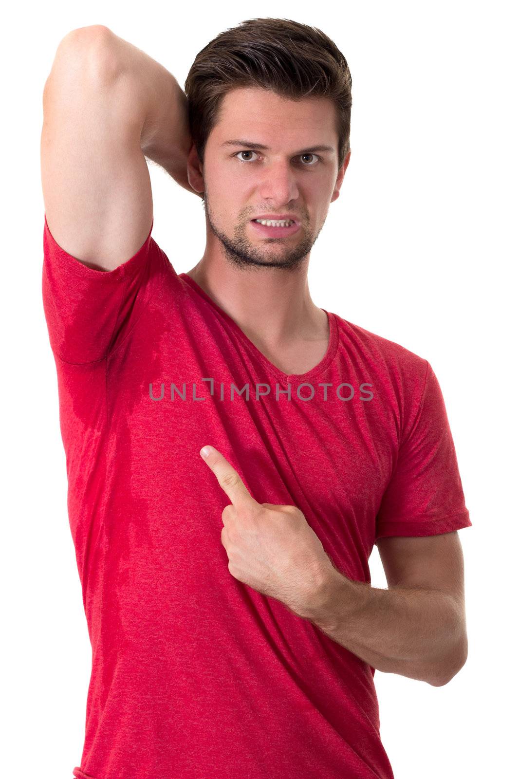 Man sweating very badly under armpit and pointing there by dwaschnig_photo