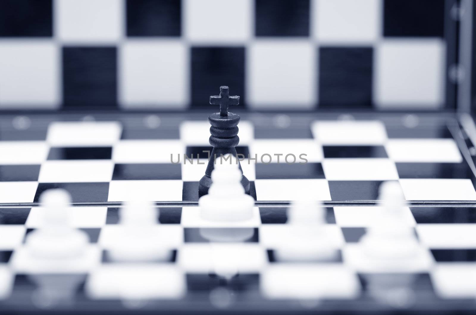 Close-up photo of the chessmen on a chessboard