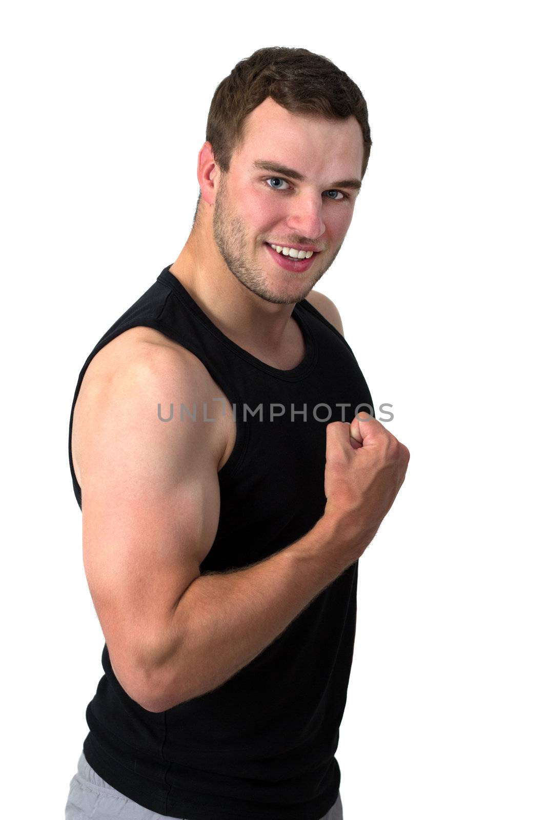 Young attractive man flexing his biceps by dwaschnig_photo
