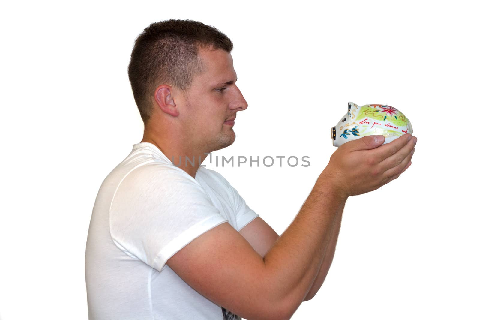 Young Man Holding Piggy Bank by dwaschnig_photo
