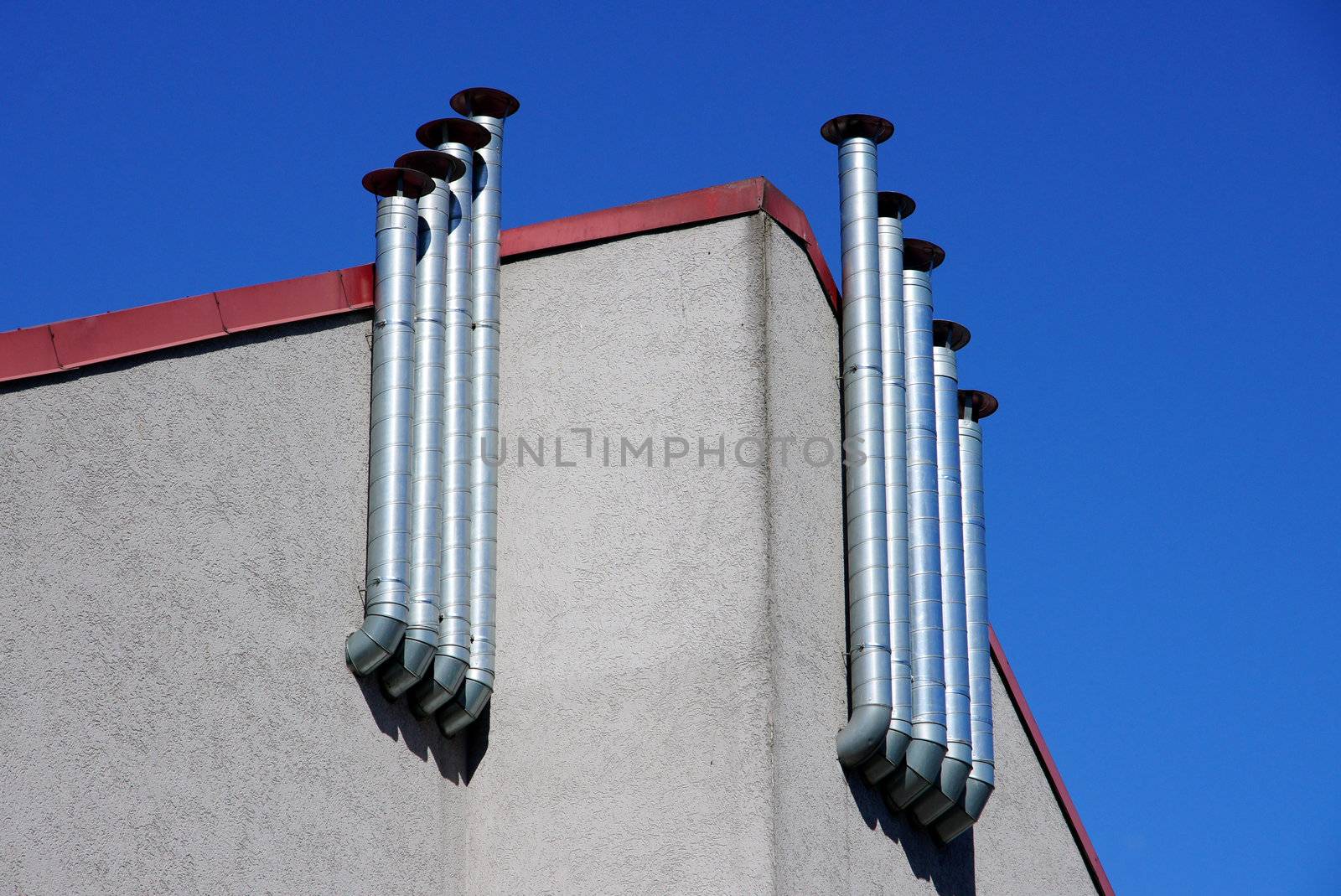 Metal pipes are located in one line