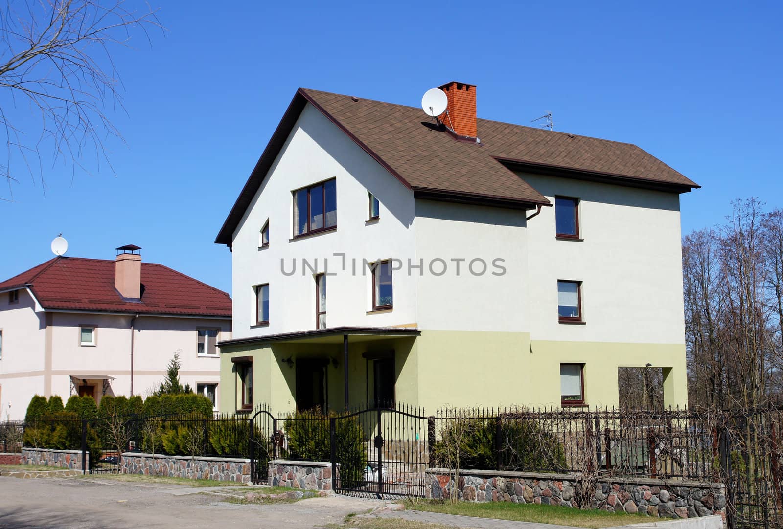 The modern house on a background of the blue sky