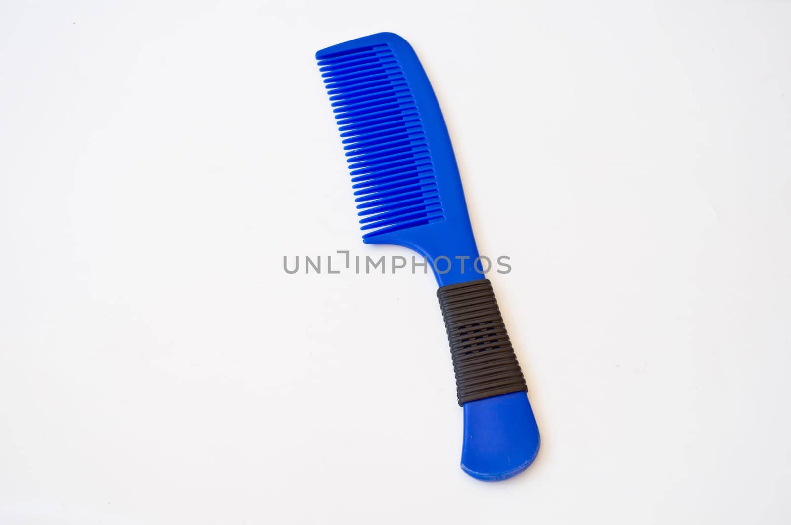 blue comb on white background