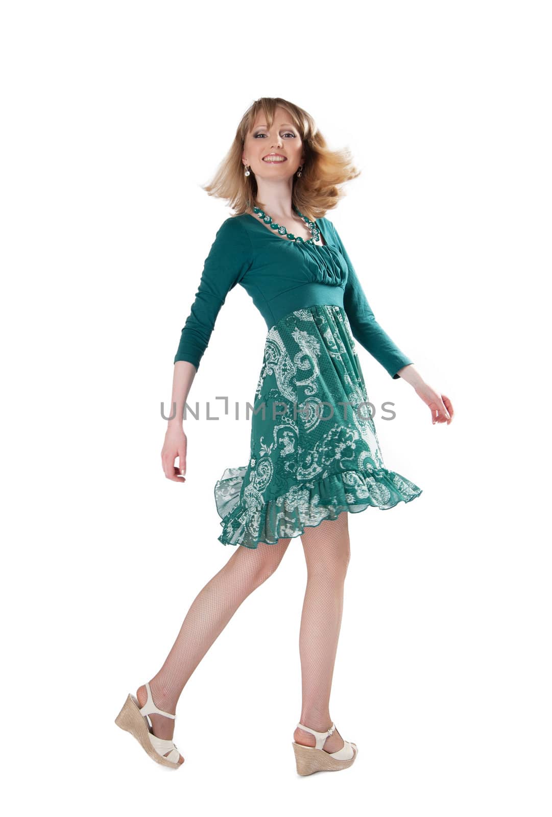 beautiful woman in a green dress and beads isolated on white background