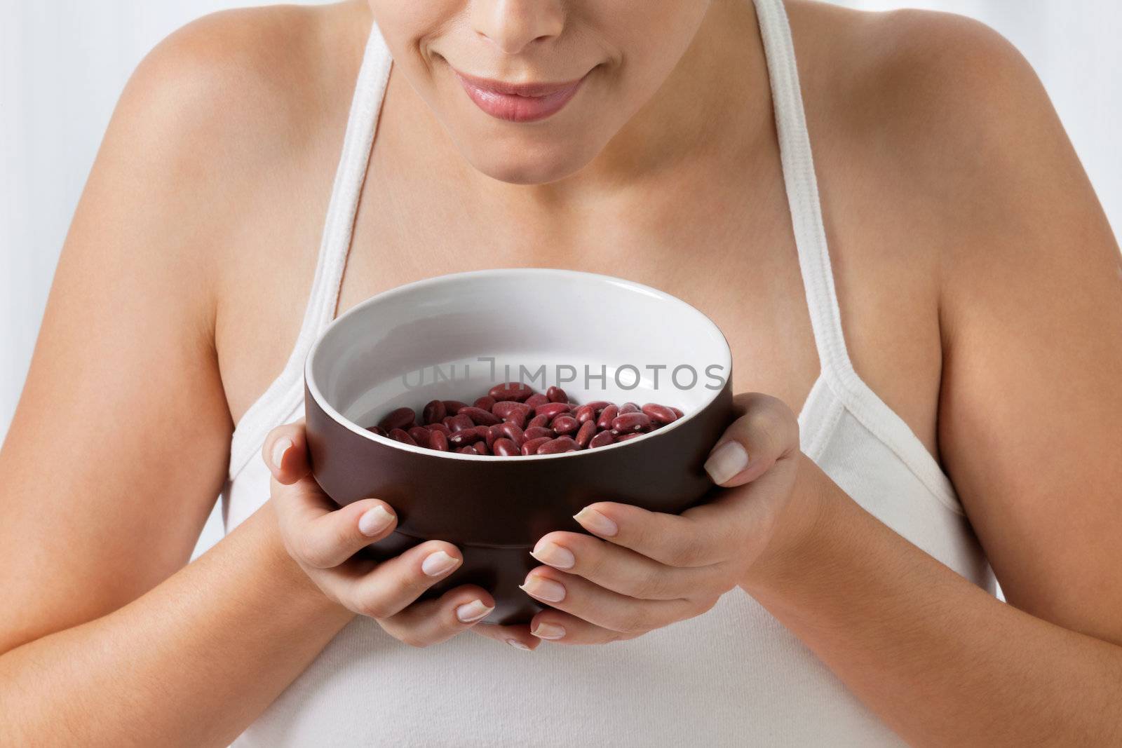 Woman With Bowl Of Kidney Beans by leaf