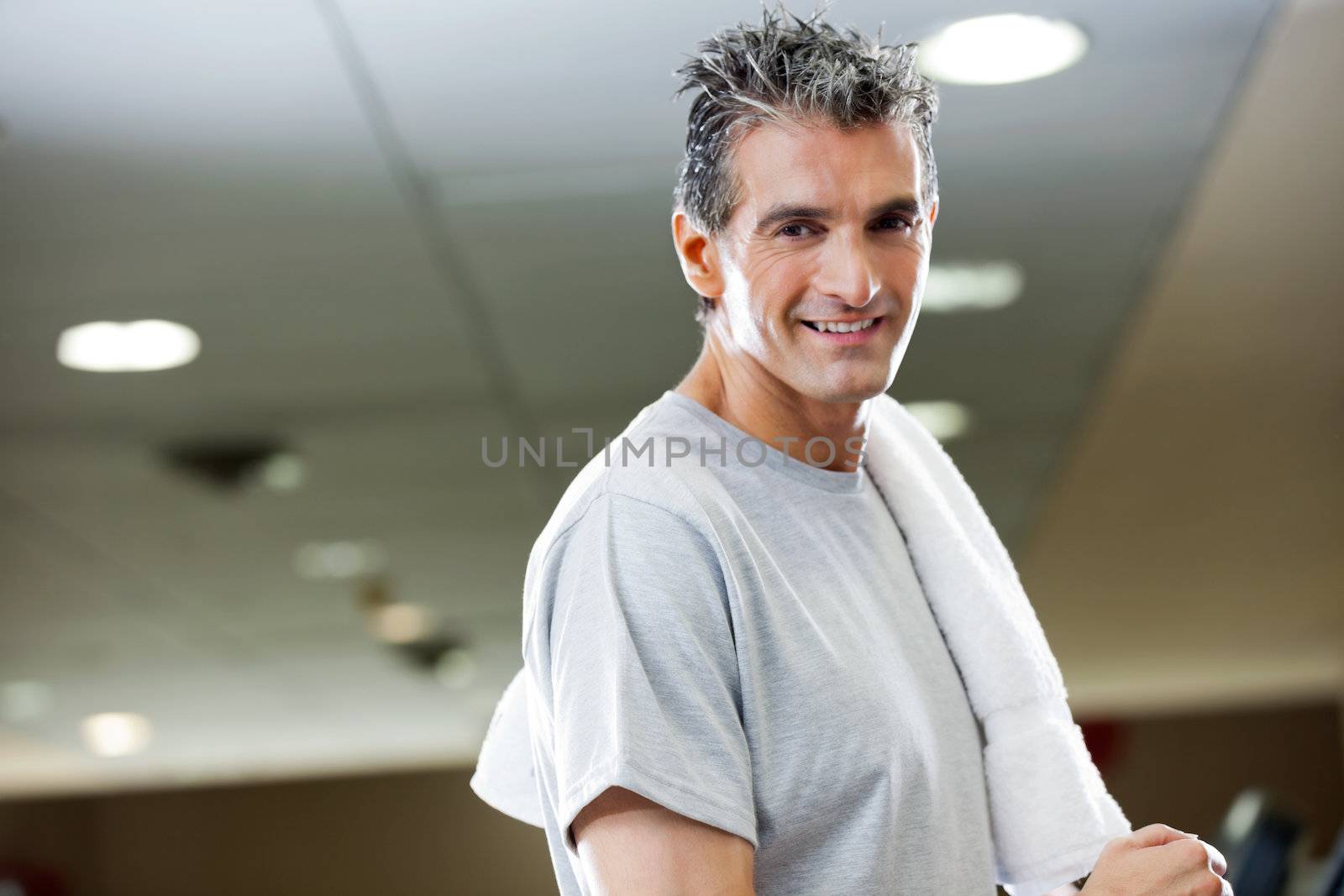 Portrait of mature man with in health club