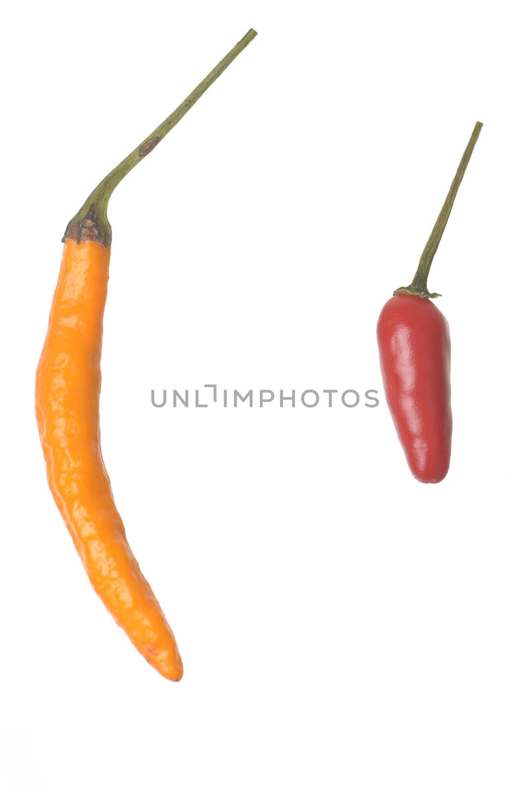 Red and Orange Thai Peppers isolated against a white background