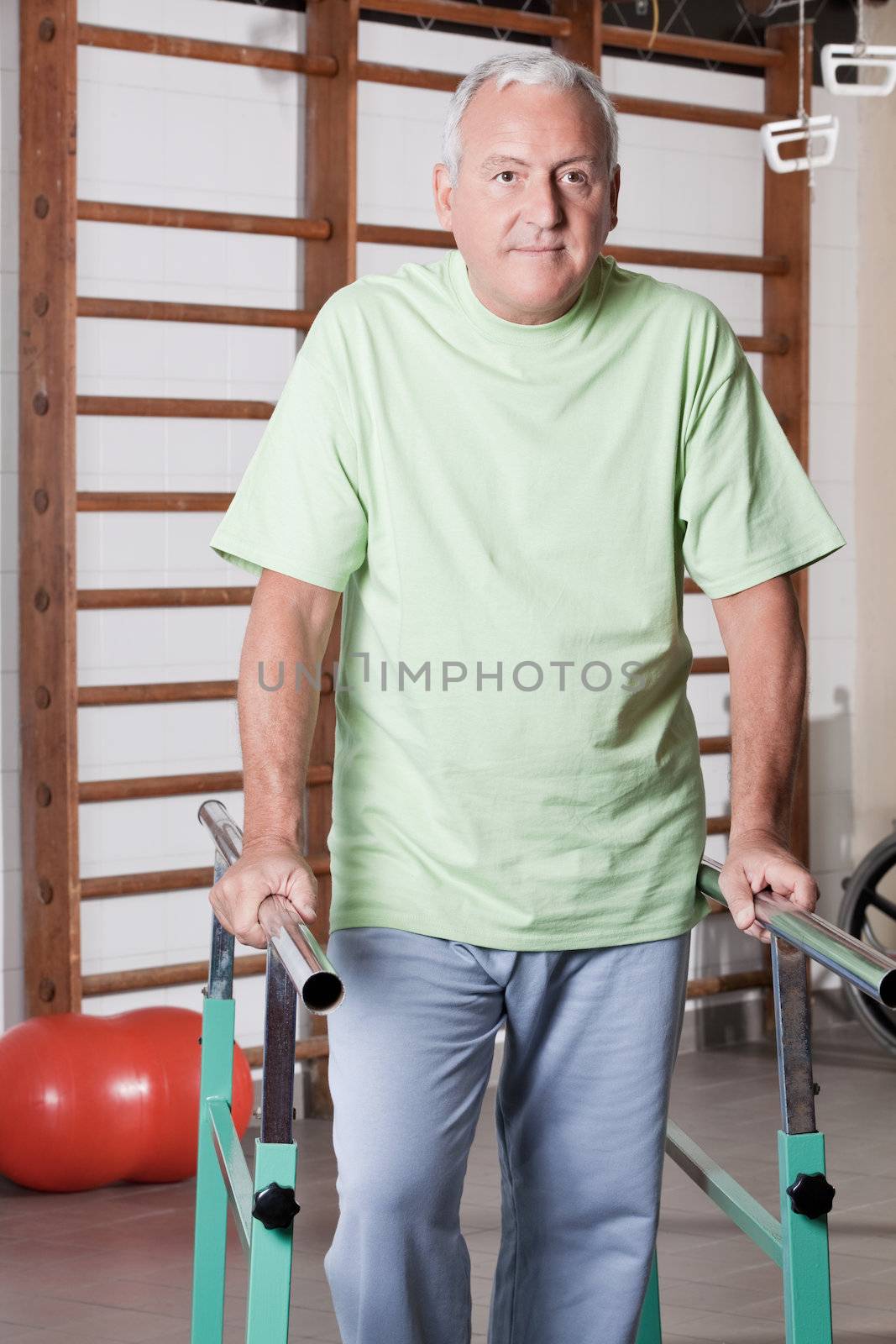 Senior Man having ambulatory therapy by leaf