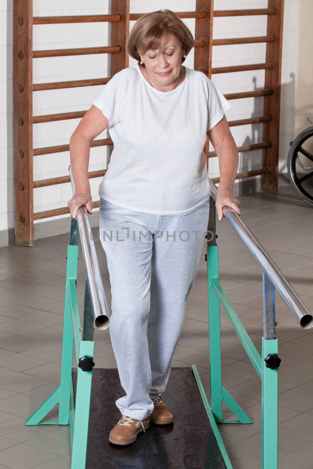 Portrait of mature man having ambulatory therapy.