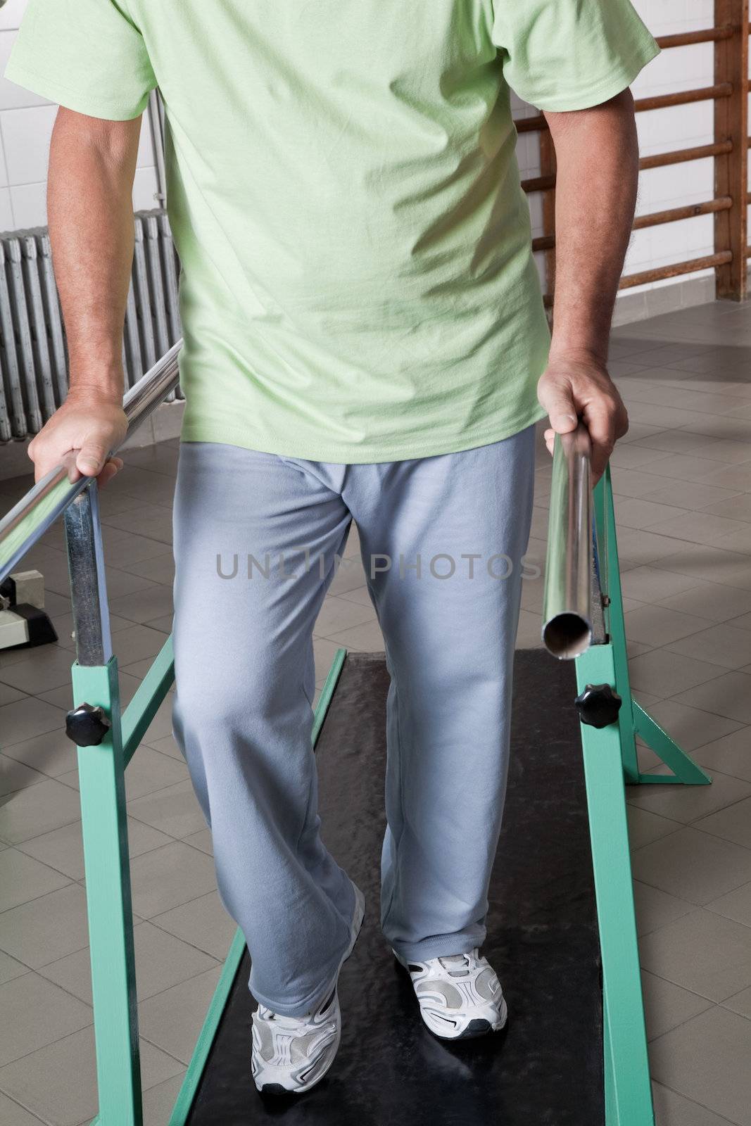 Senior Man having ambulatory therapy by leaf