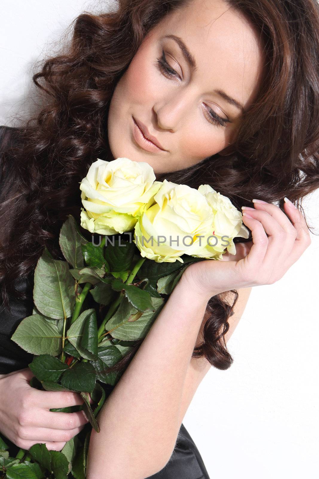 Photo of beautiful woman with white roses
