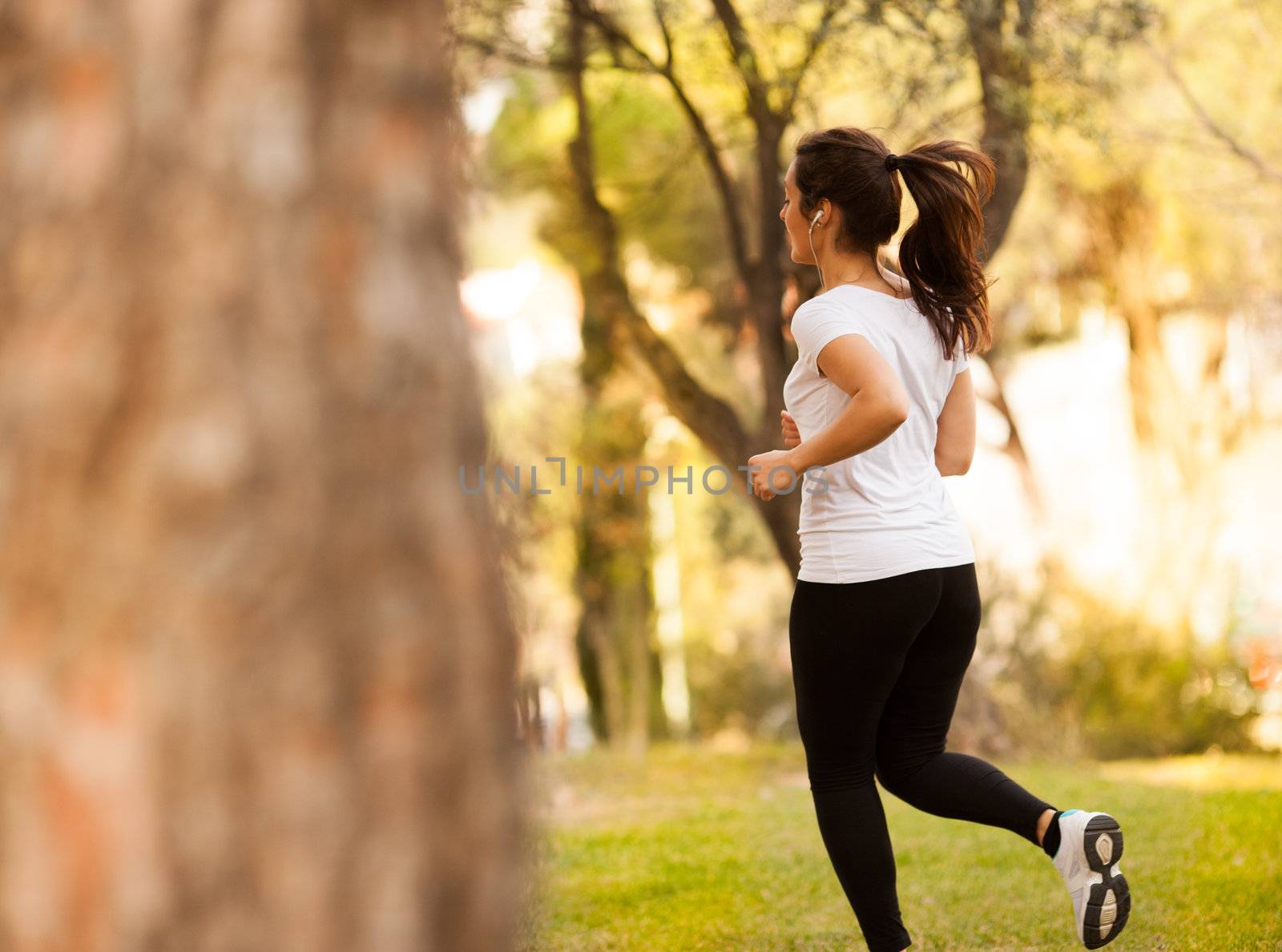 young beautiful woman jogging by Lcrespi