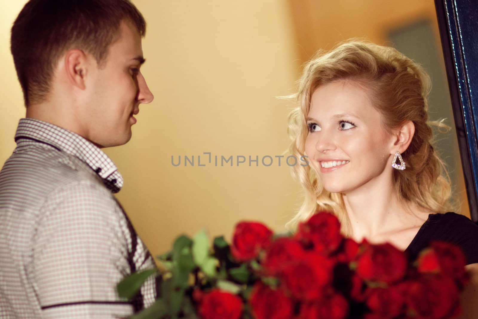 man gives roses to a girl by vsurkov
