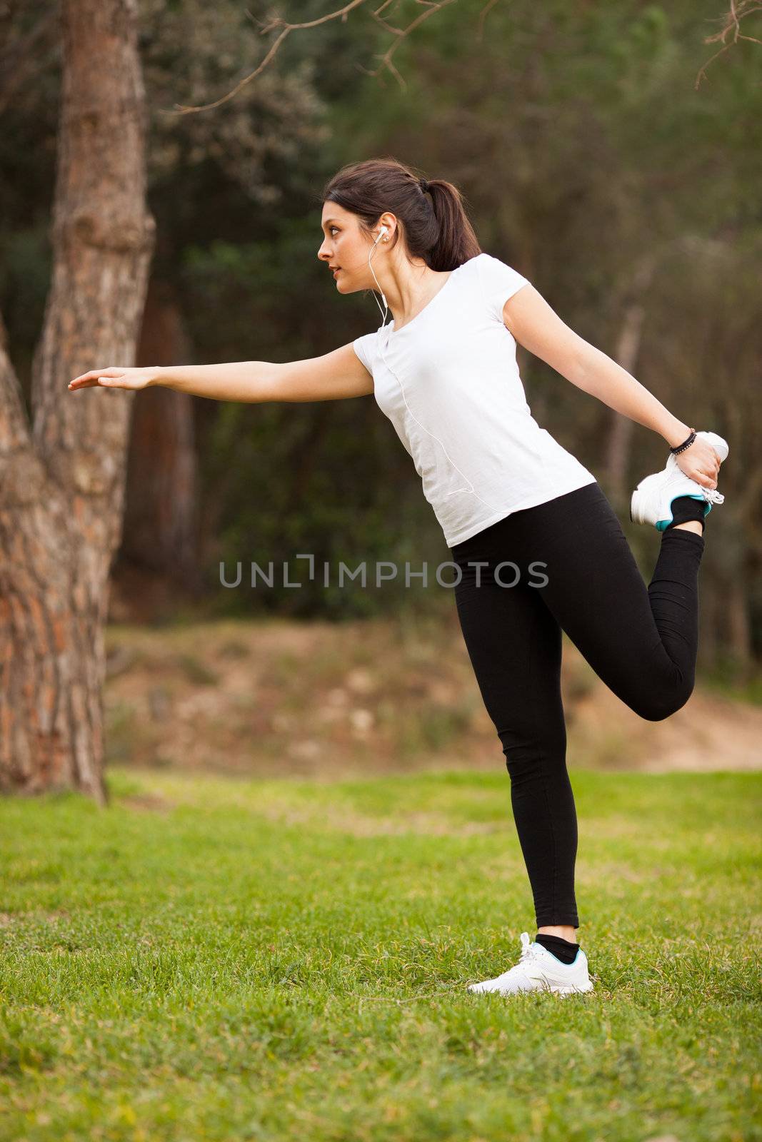 young beautiful woman stretching by Lcrespi
