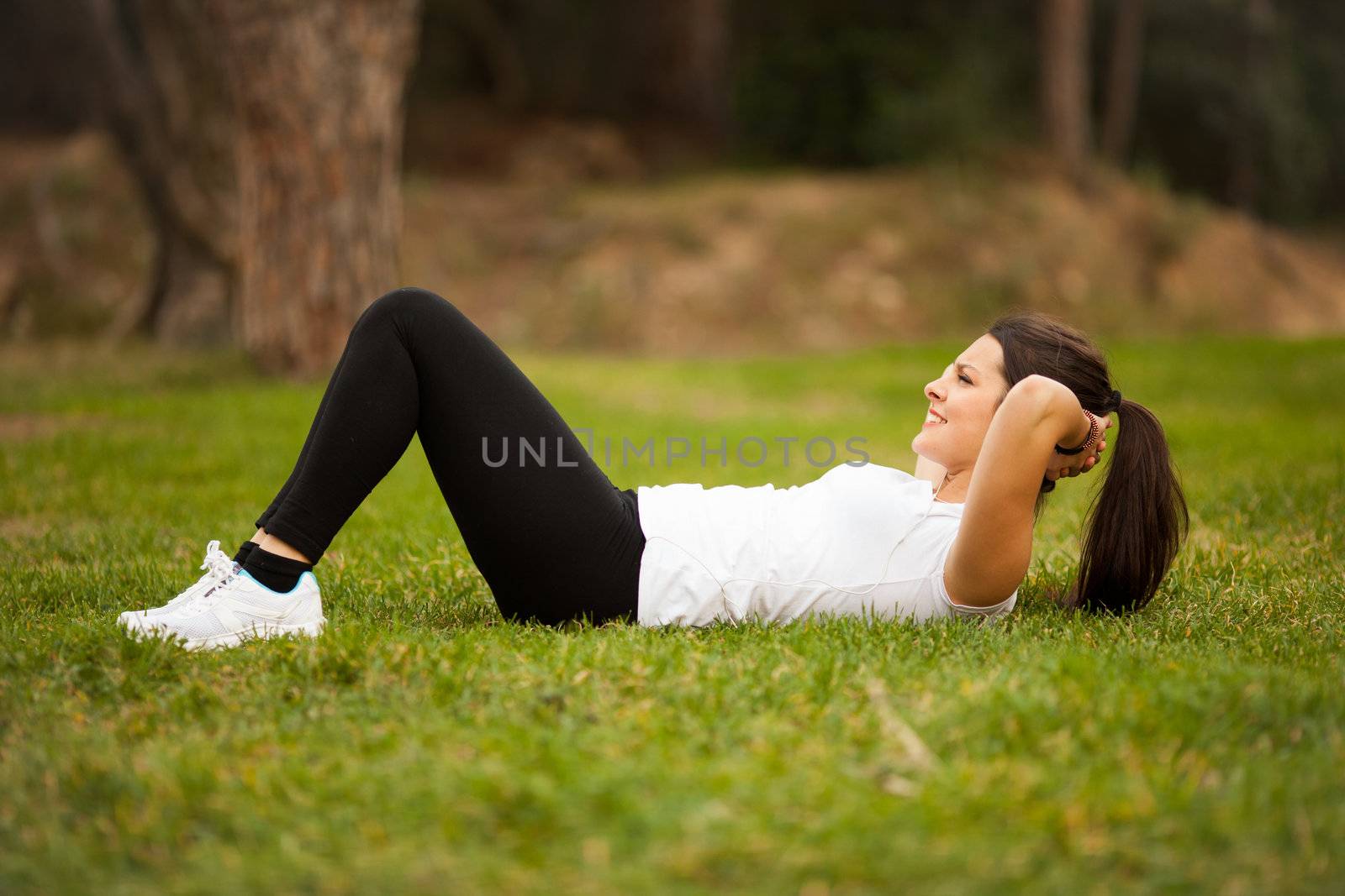 young beautiful latin woman making abs by Lcrespi