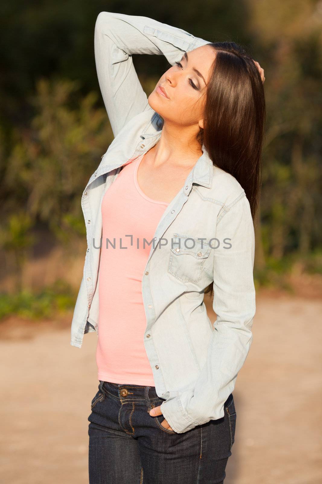 young beautiful young woman portrait on sunny day