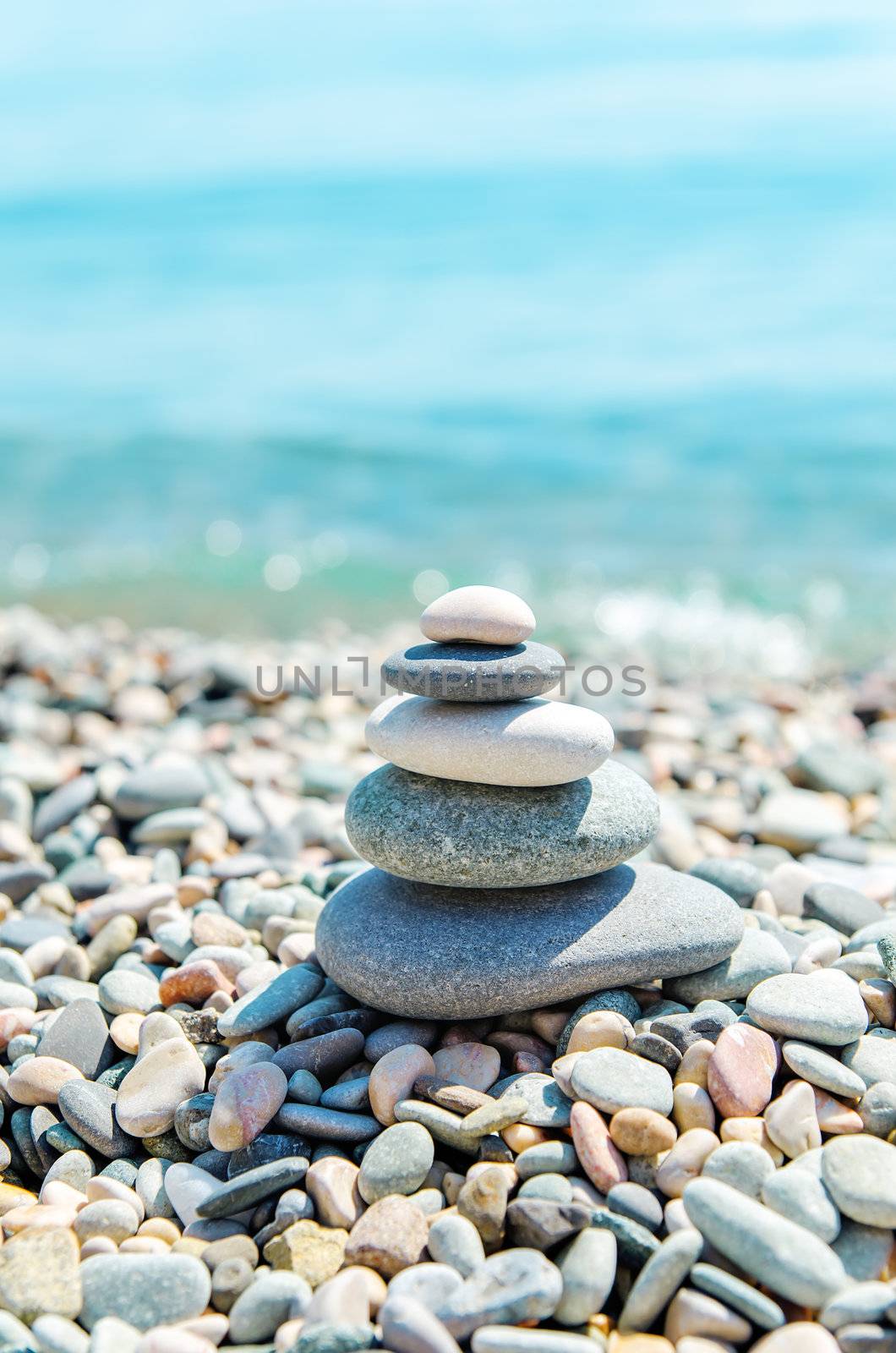 stack of zen stones near sea