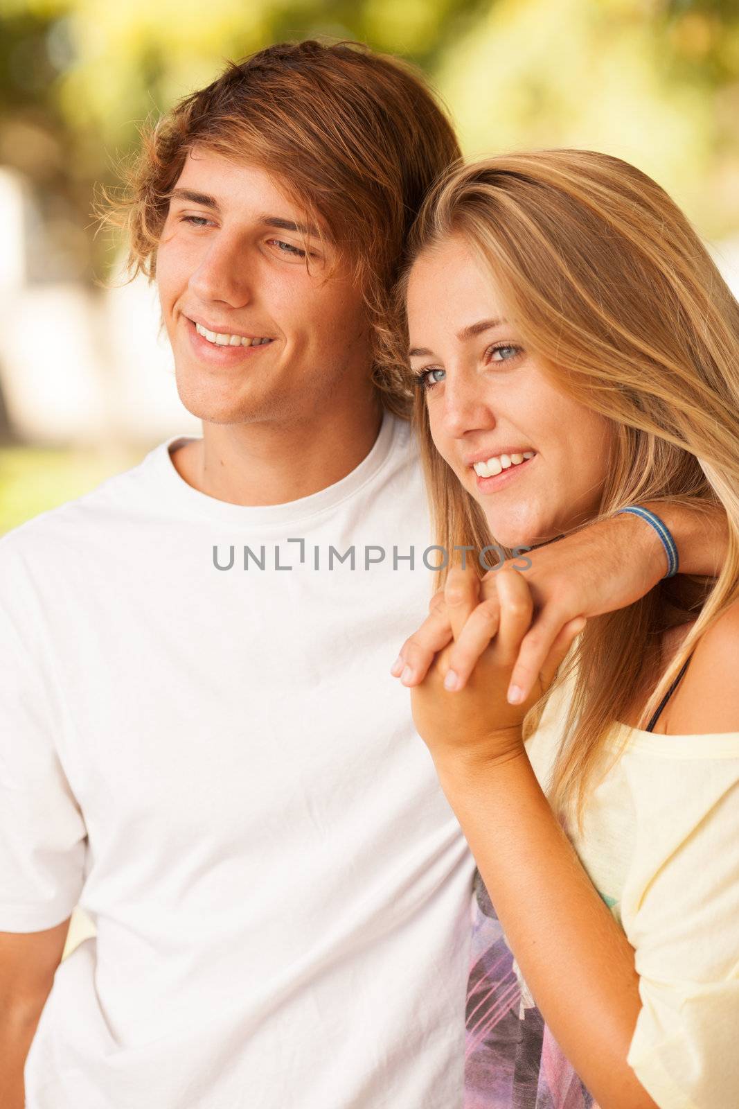 young beautiful couple enjoying a day on the park on summer