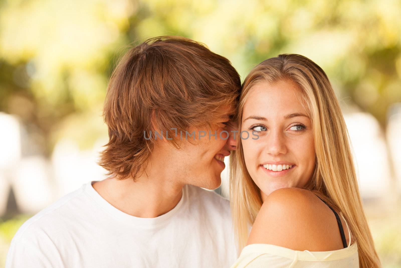 young beautiful couple enjoying a day on the park on summer