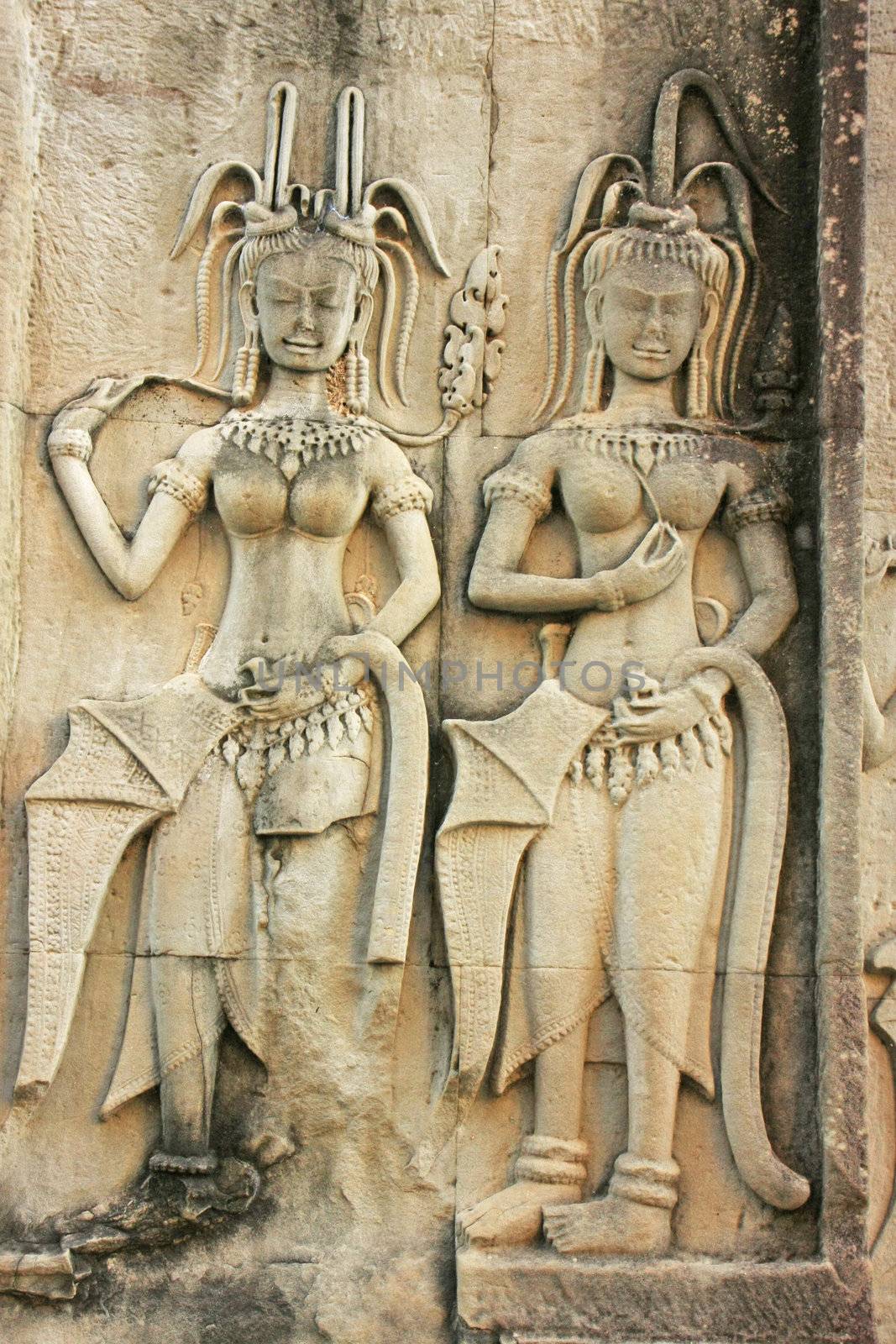 Wall bas-relief of Devatas, Angkor Wat temple, Siem Reap, Cambod by donya_nedomam