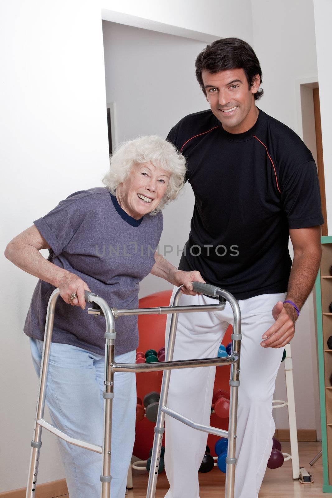 Therapist helping Patient use Walker by leaf
