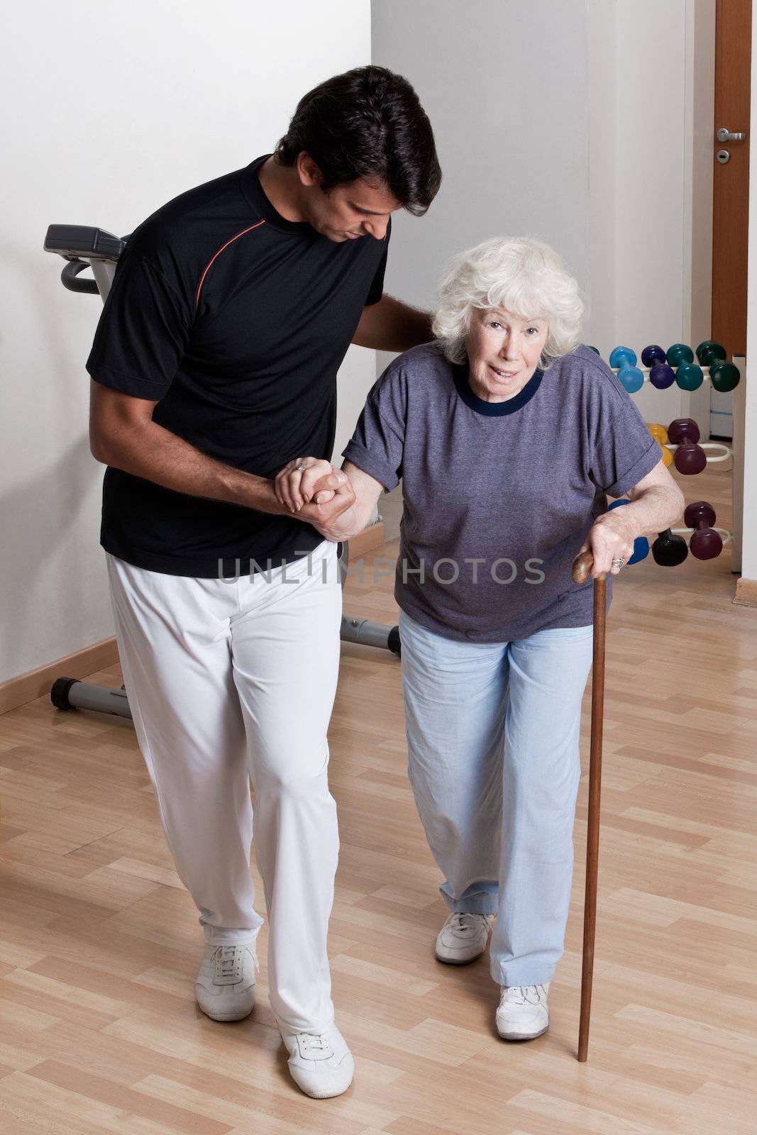 Therapist helping Patient To Walk by leaf
